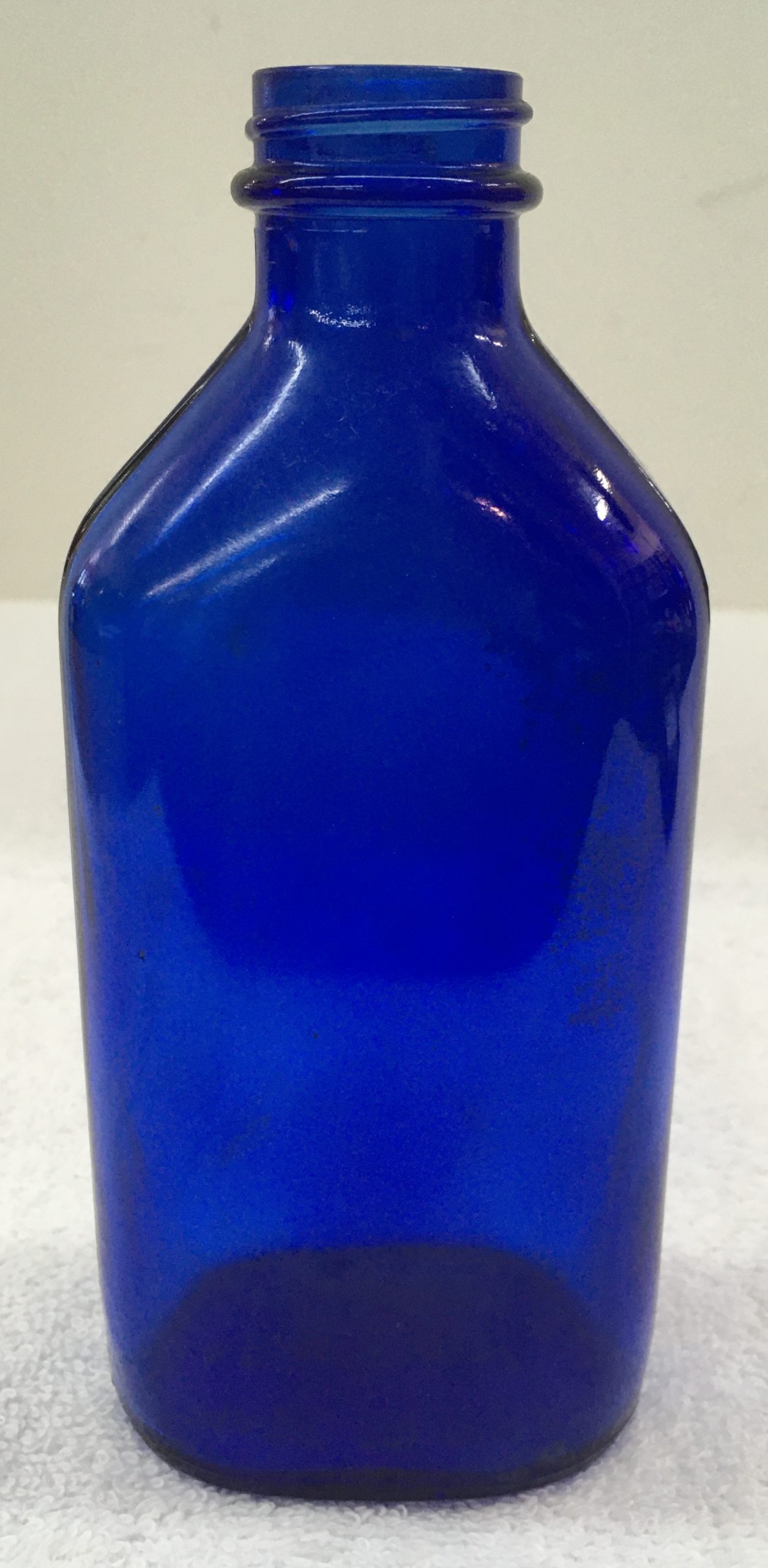 https://jpahome.com/wp-content/uploads/2020/12/C365-100220-006-Phillips-Milk-of-Magnesia-Cobalt-Blue-Glass-Bottle-9-1-scaled.jpg